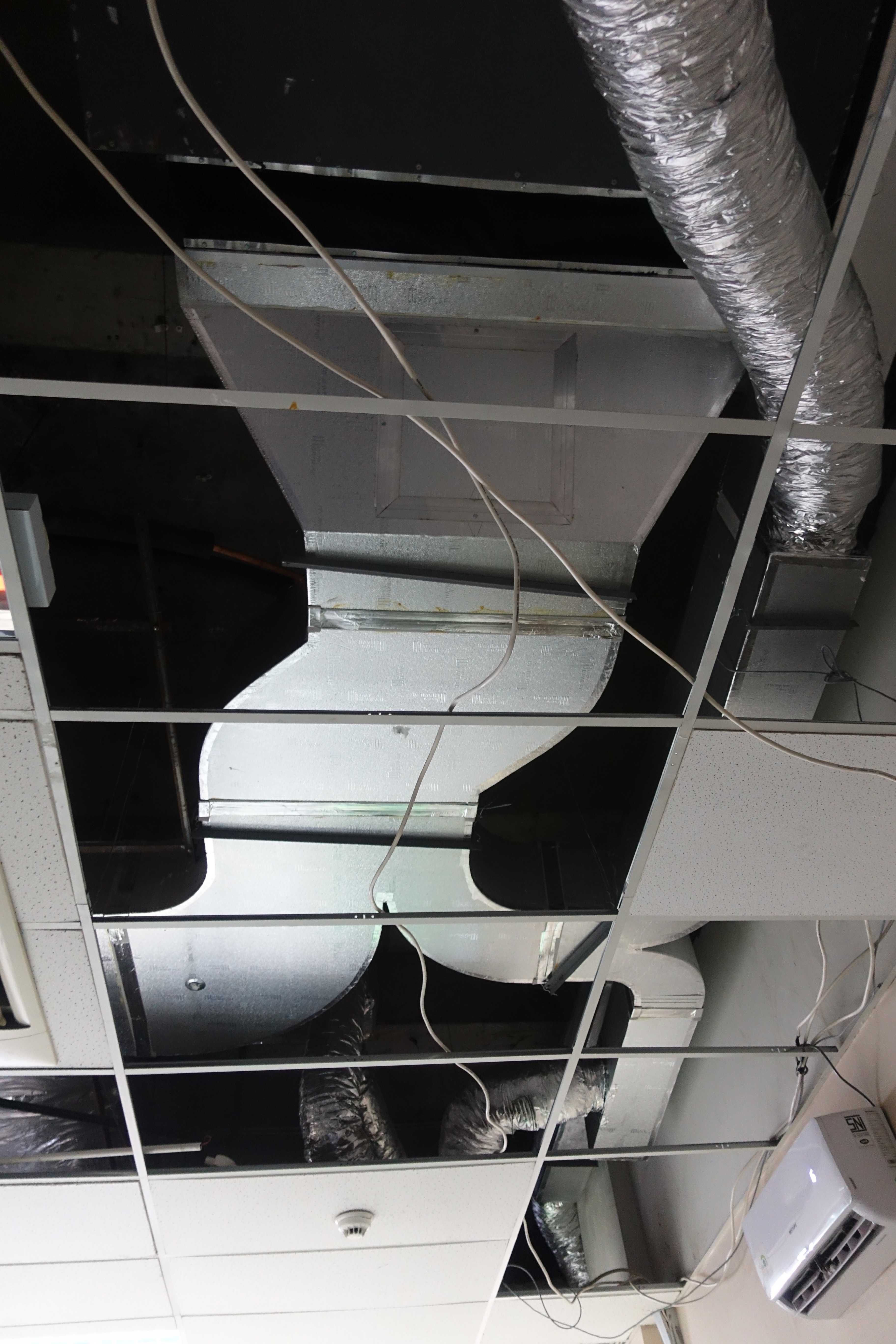 Insulated HVAC ductwork and flexible ducts routed through a suspended ceiling