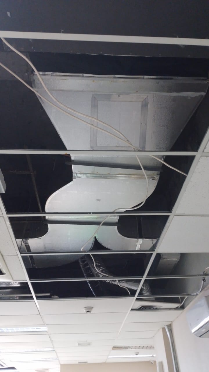 Royal Duct pre-insulated ducting installed above a suspended ceiling grid
